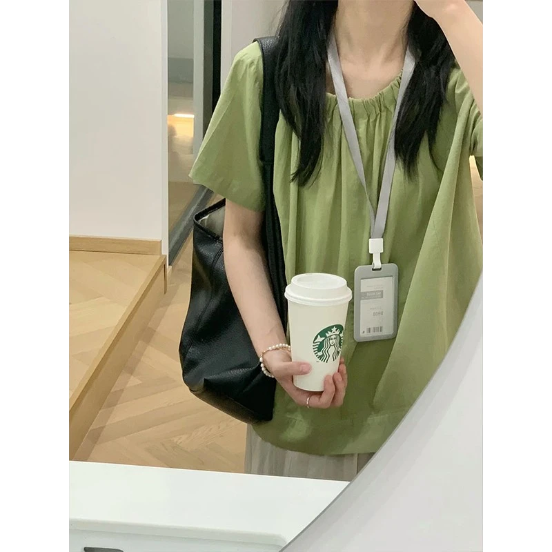 韩系设计感绿色短袖衬衫女夏季罩衫别致绝美娃娃衫后背纽扣上衣