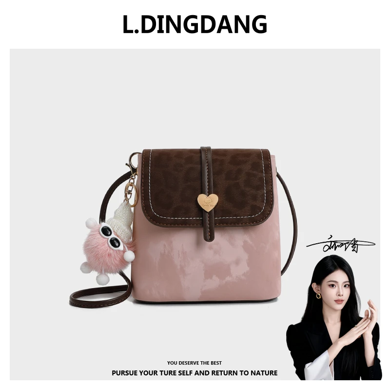 【刘叮当甄选】/复古潮流通勤布偶桶包单肩斜挎8002花色