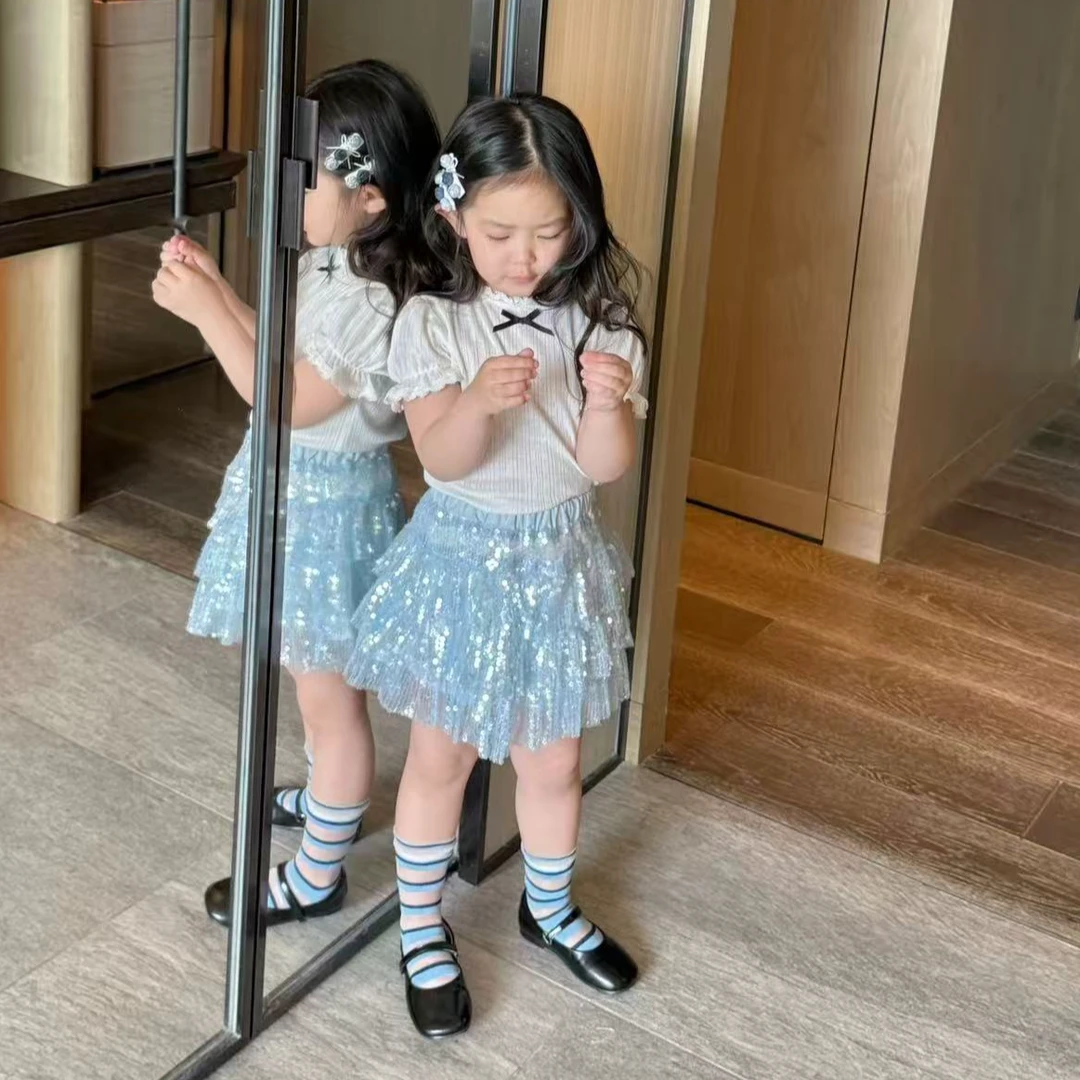 小惜亦2025女孩夏装新款萌娃穿搭蝴蝶结短袖上衣镭射半身裙两件套