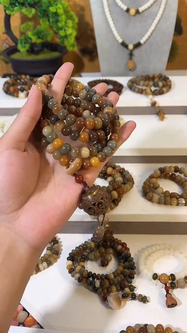 吊坠菩提根/象牙果卡8*10敦煌108颗