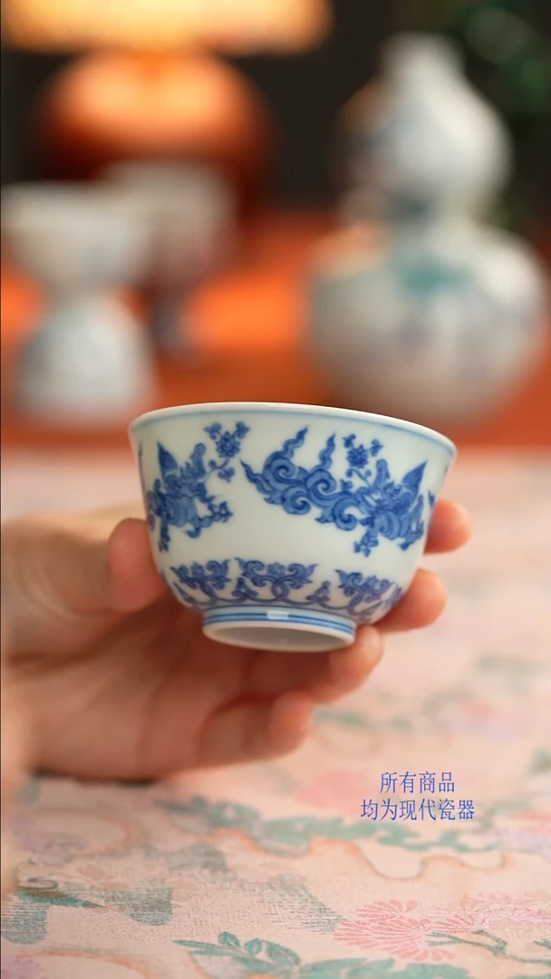 源明青忆夔龙纹撇口杯