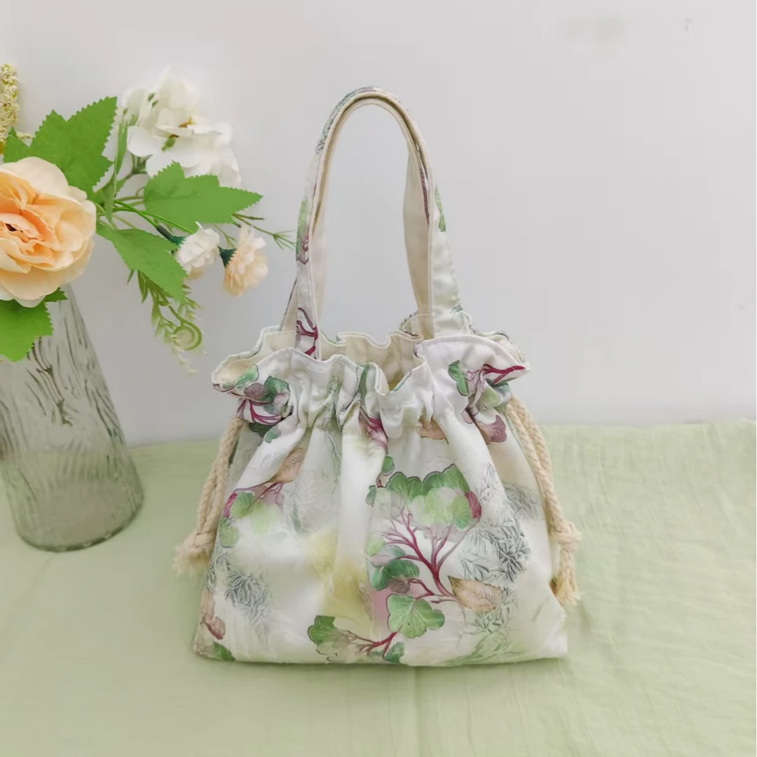 国风提花抽绳女士手提包斜挎包上班便携包古风手拎包轻便大容量