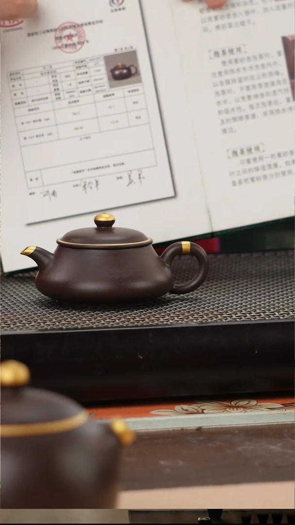 茶壶紫砂四号井茄皮紫泥描金明炉110cc