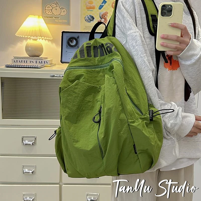 探屿新款双肩包女旅游轻便大容量简约休闲百搭大学生上课通勤书包