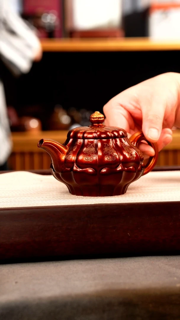 茶壶紫砂金贝烧 筋纹合菱 刻绘