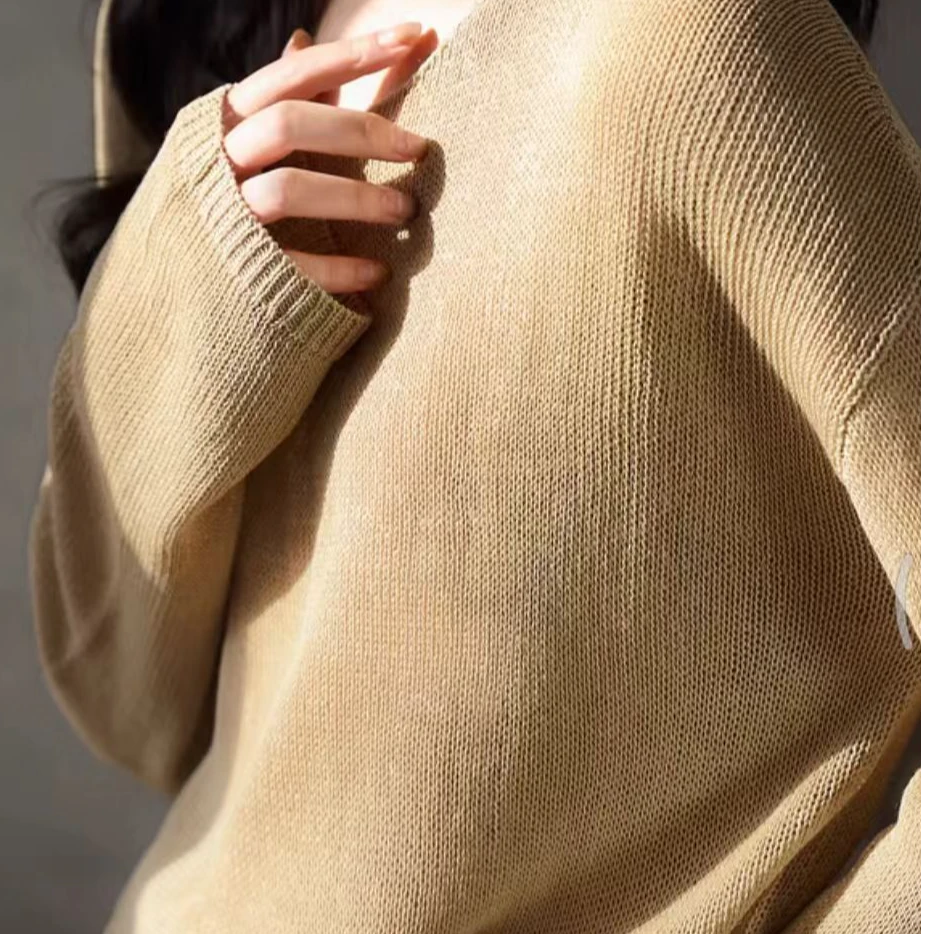 新款镂空氛围感慵懒风V领长袖宽松针织上衣女