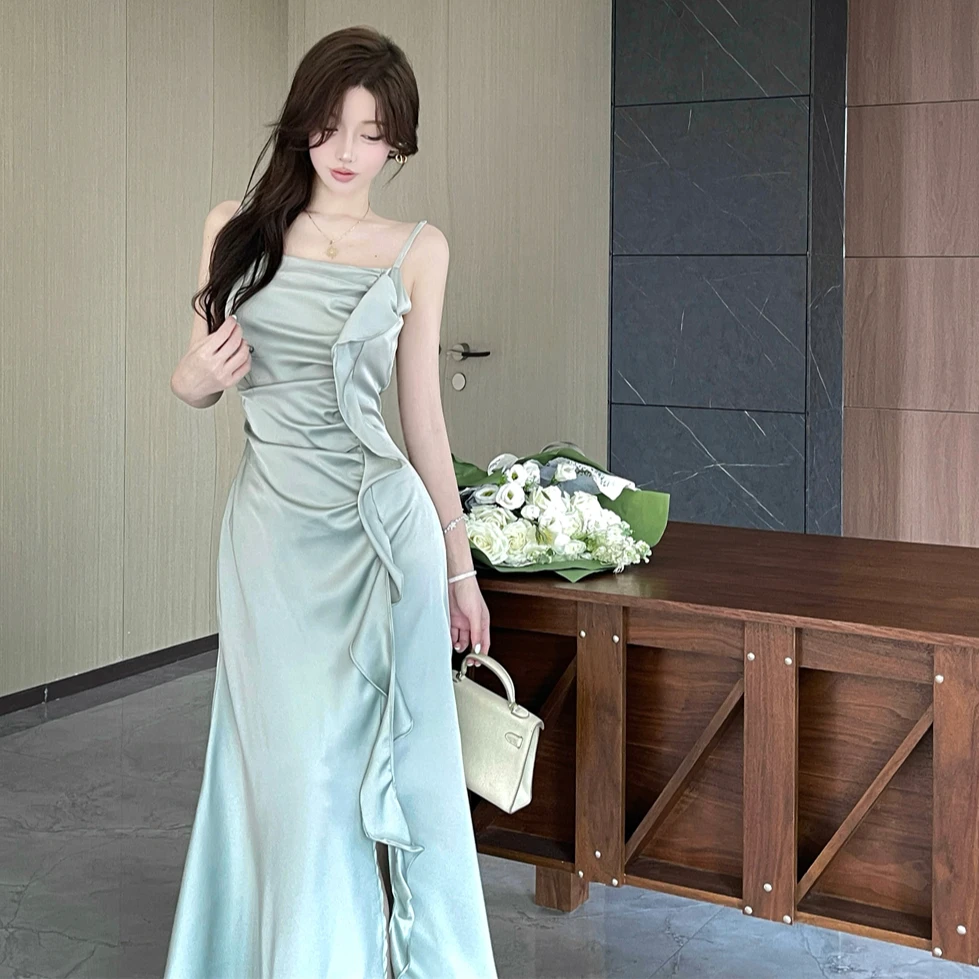 法式高级感绿色醋酸缎面吊带连衣裙荷叶边气质名媛收腰开叉长裙夏