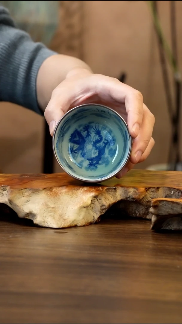 景德镇高温瓷九龙卧足杯