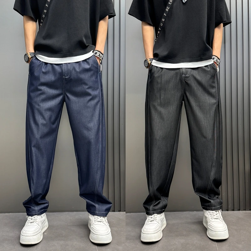 2025年春夏薄款潮流韩版痞帅宽松哈伦裤青年男士休闲水洗牛仔裤子