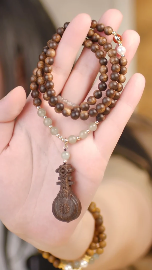 （三圈全沉白奇楠0.6项链+琵琶吊坠）