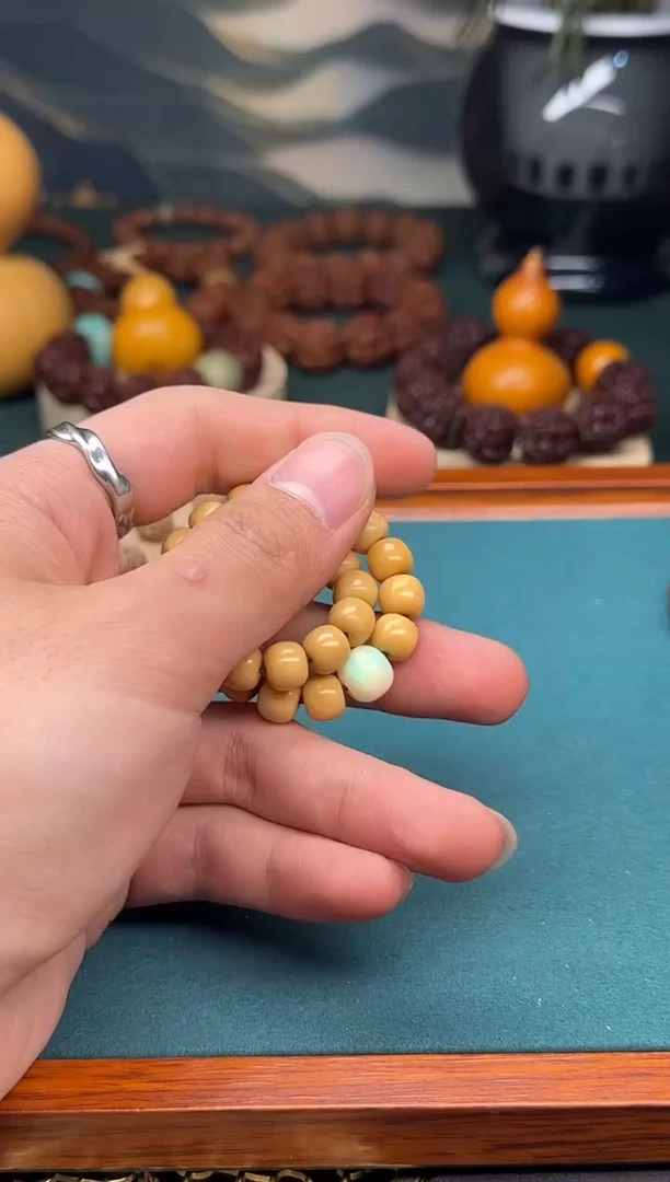 【闪购商品】文玩核桃吊坠大龙脊手串尺寸9*8左右带黄欧珀配饰