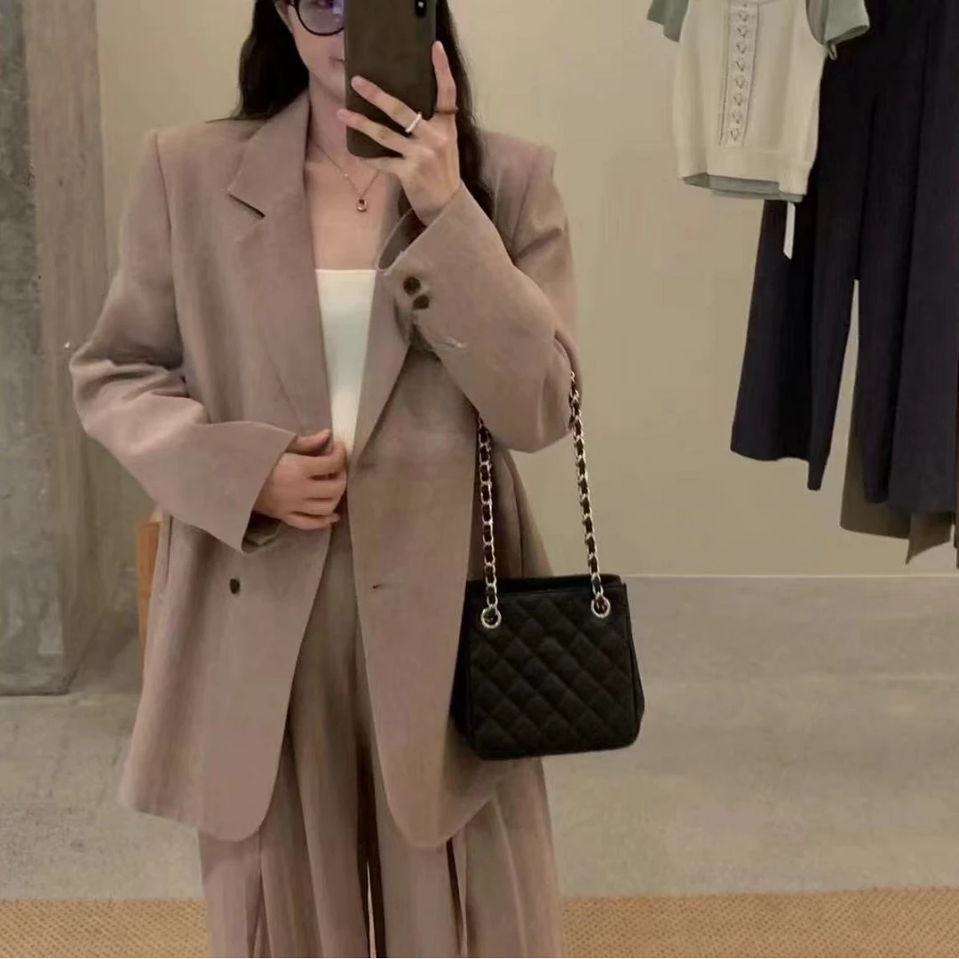2781号56589#秋纯色垫肩气质简约百搭侧双口袋后下摆开叉西装外套