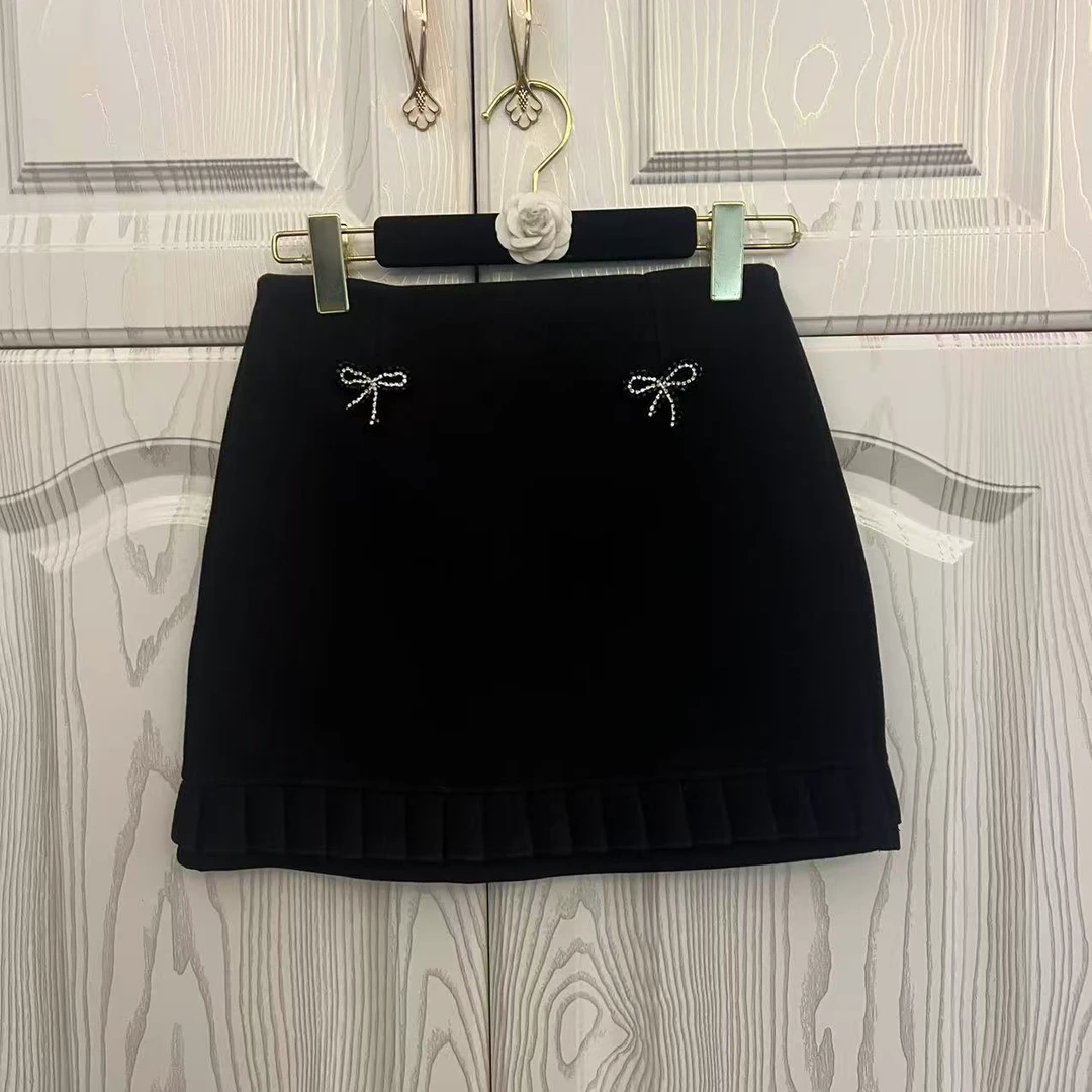 YDNalways品牌设计款钉钻蝴蝶结时尚百搭毛呢半裙