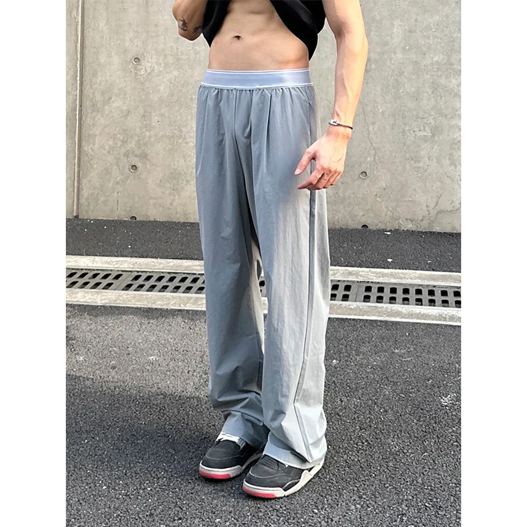 灰色运动冰丝速干裤男款夏季薄款凉感冰皮裤子高腰美式微喇休闲裤