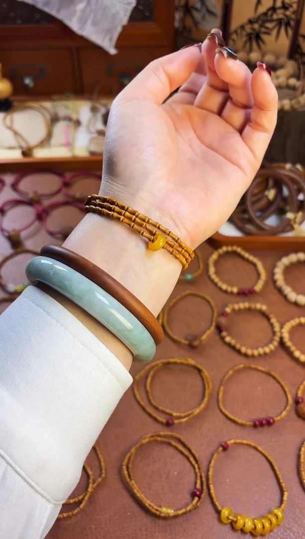 手串桃核竹节三圈黄跑环