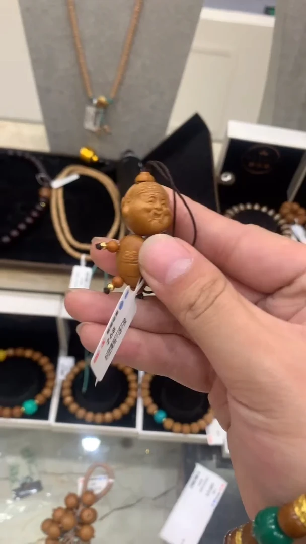 手串猴头核桃往***风猴头雕刻手机链