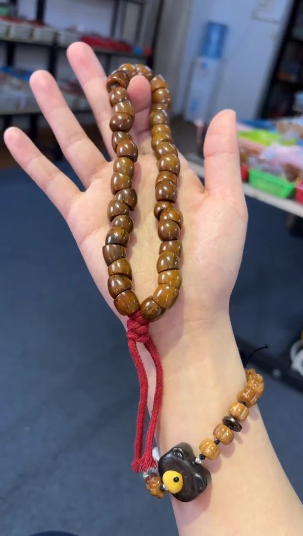 吊坠菩提根/象牙果紫金鼠大肠素圈手持