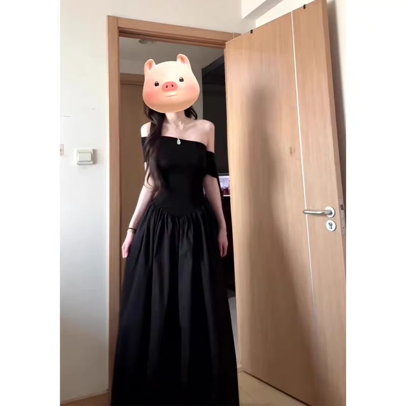 一字肩连衣裙女2025新款设计感独特别致显瘦纯欲露肩长裙子