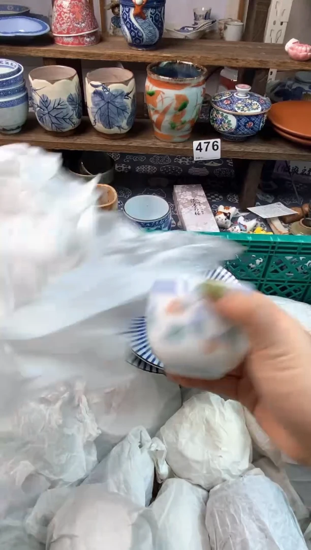 瓷片心**贝