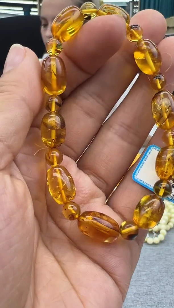 未镶嵌琥珀手链103秒拍号假一罚十