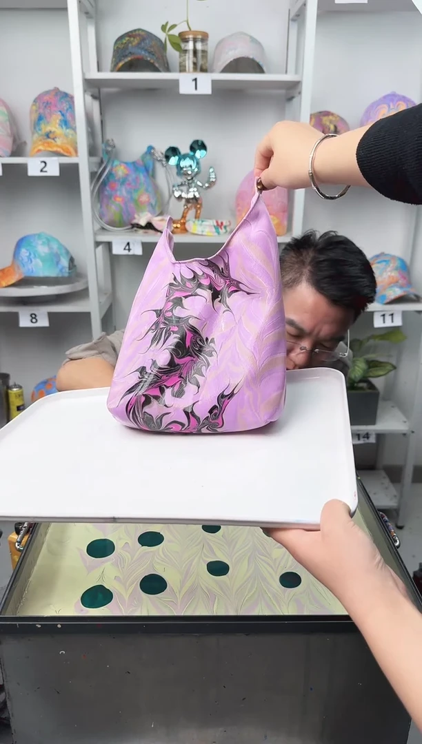 棉龙图案水拓包包