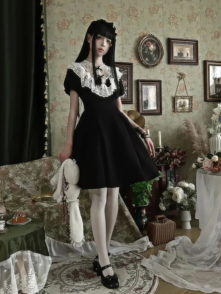 日系甜美气质黑白拼接蕾丝边蝴蝶结灯笼袖连衣裙夏季收腰显瘦短裙