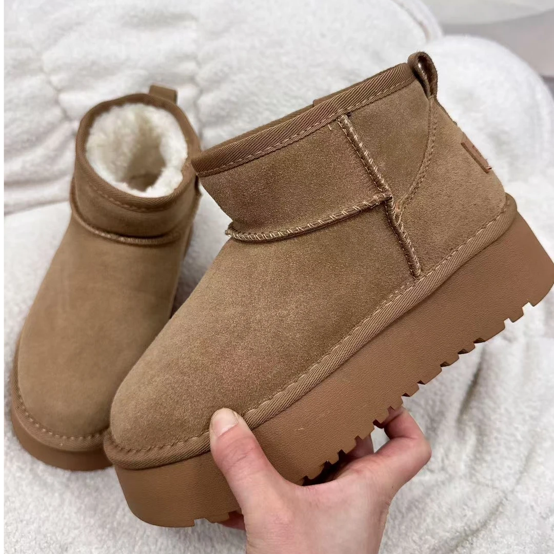 5566女款成人牛皮大棉跟高4厘米雪地靴