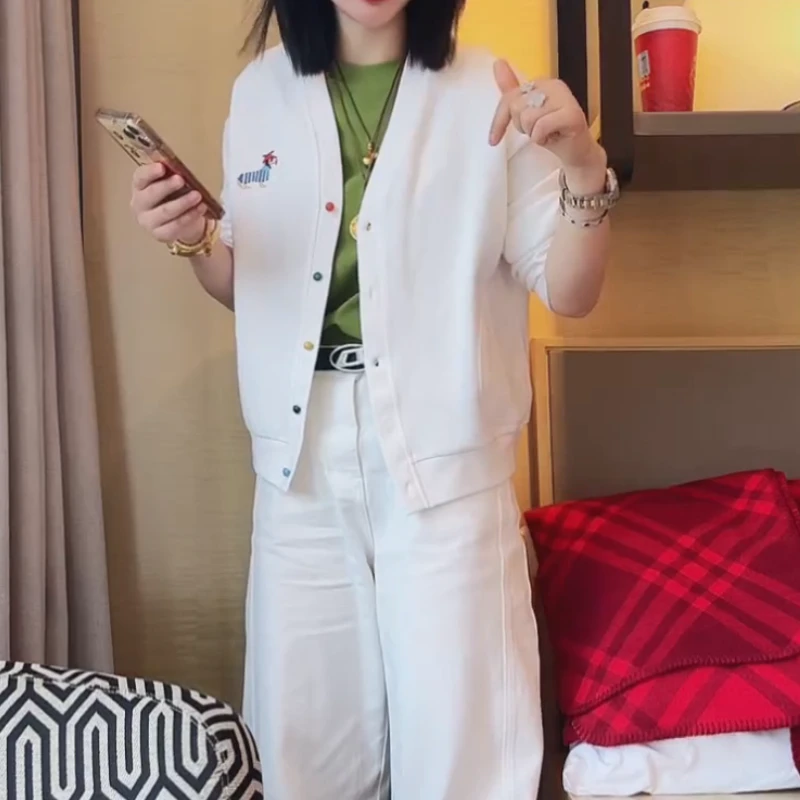 2025年早春新款胸口小狗刺绣纽扣款外套上衣LK2501360