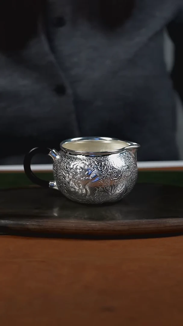 手工锤纹牡丹公道杯