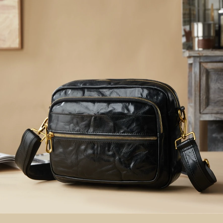 复古植鞣头层牛皮男士单肩斜挎包真皮大容量潮牌包休闲百搭邮差包