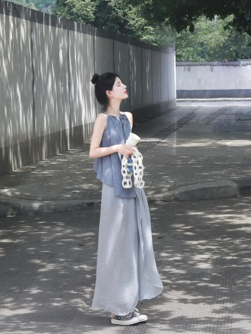 2025年夏装洋气设计感辣妹不规则吊带露肩挂脖背心半身裙两件套装