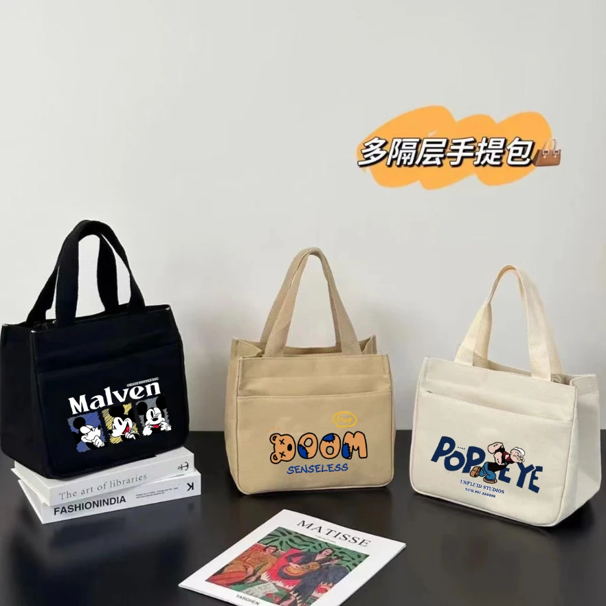 新款手提包帆布包大容量简约上班族学生百搭饭盒妈咪上班便当包TL