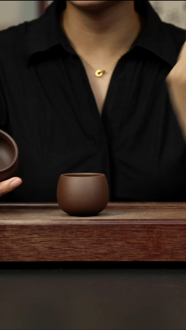 紫砂茶杯紫泥 不倒翁杯