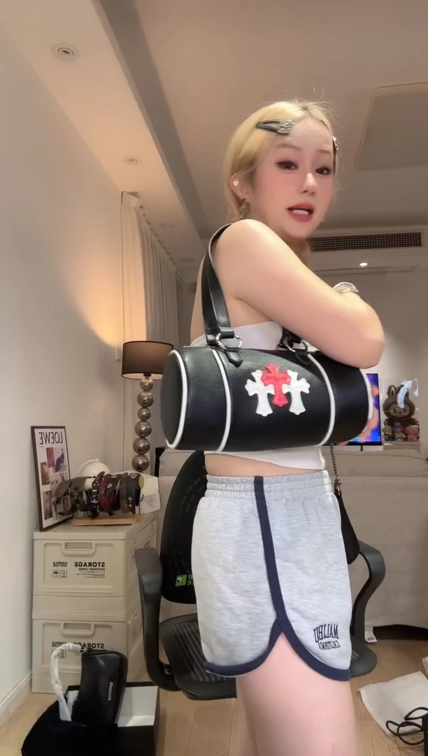 牦牛剖层皮革赤炎红水桶包