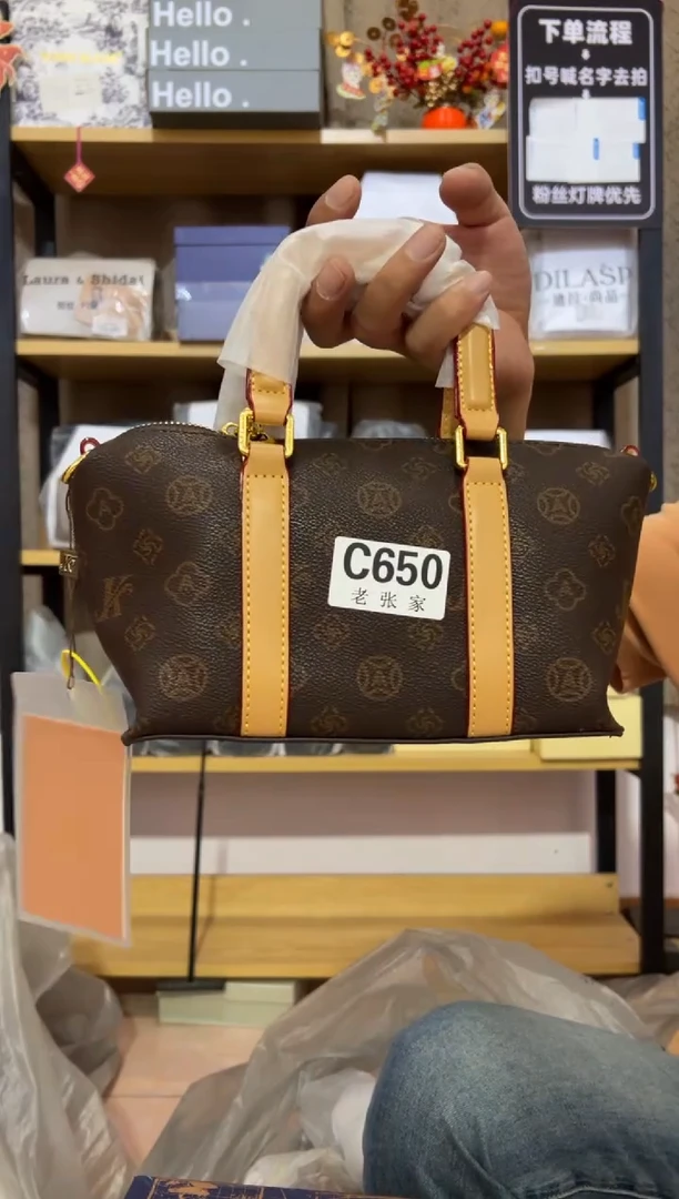 小牛剖层皮革老张家女包650