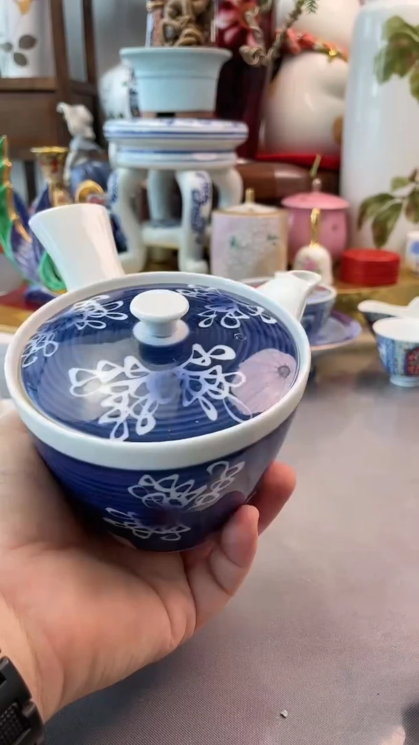 瓷片日产青花侧把壶