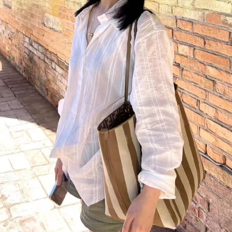 『朱小姐』“春日之约”松驰感宽松竖纹肌理白衬衫女 F702