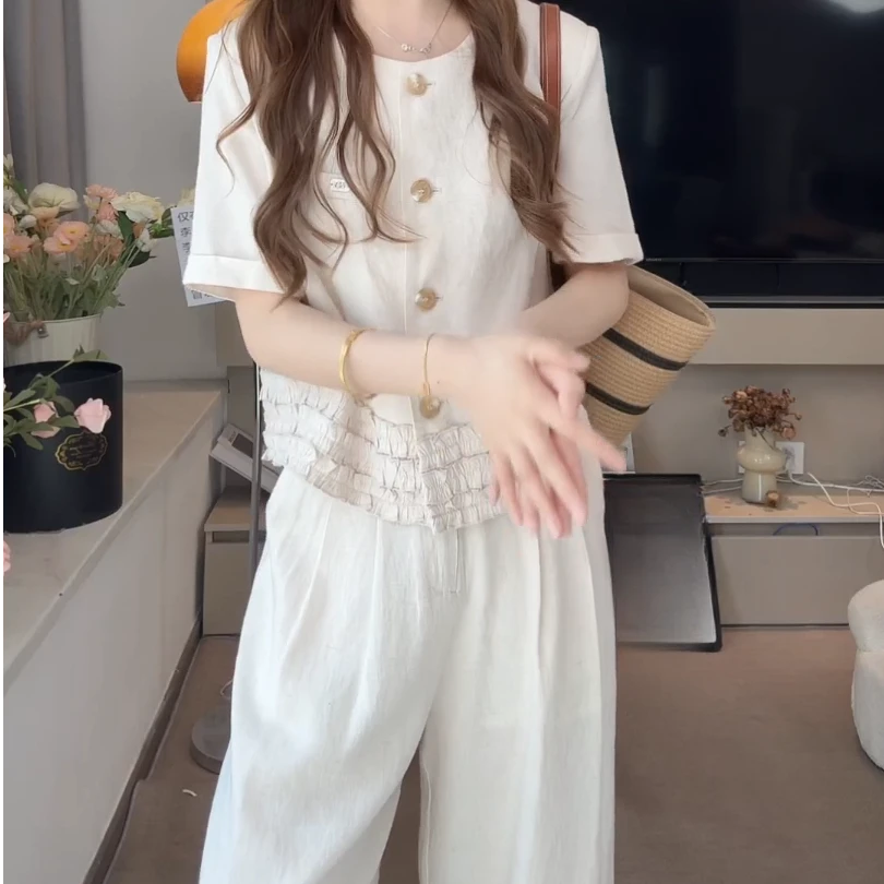 松弛感休闲马甲套装女夏季新款设计感木耳边高腰阔腿裤两件套