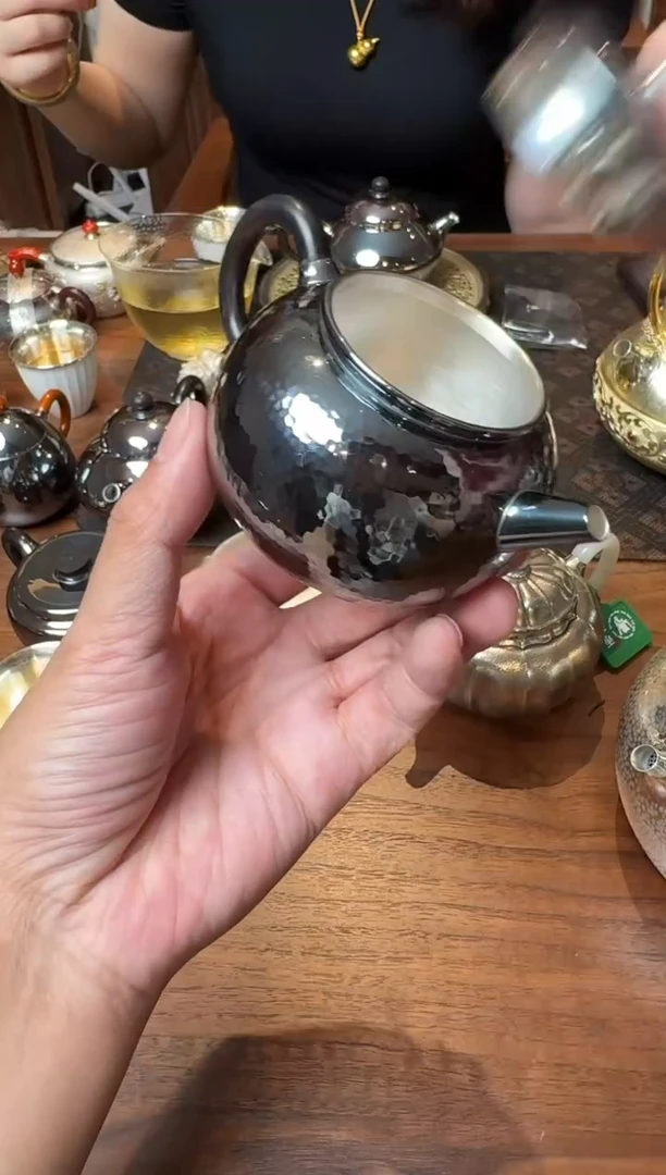 '呆坐 玄紫锤纹如意圆融壶