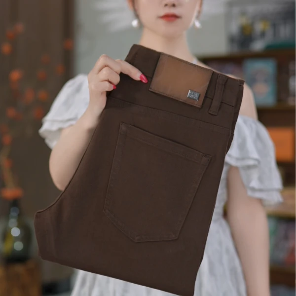 咖啡色九分牛仔裤男2025秋冬款琥珀色高档品牌轻奢牛仔裤男款裤子