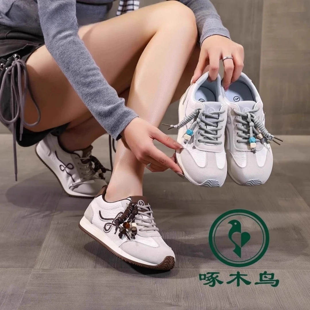 啄木鸟潮牌轻便女士德训鞋2025秋季网红款增高百搭真皮运动休闲鞋