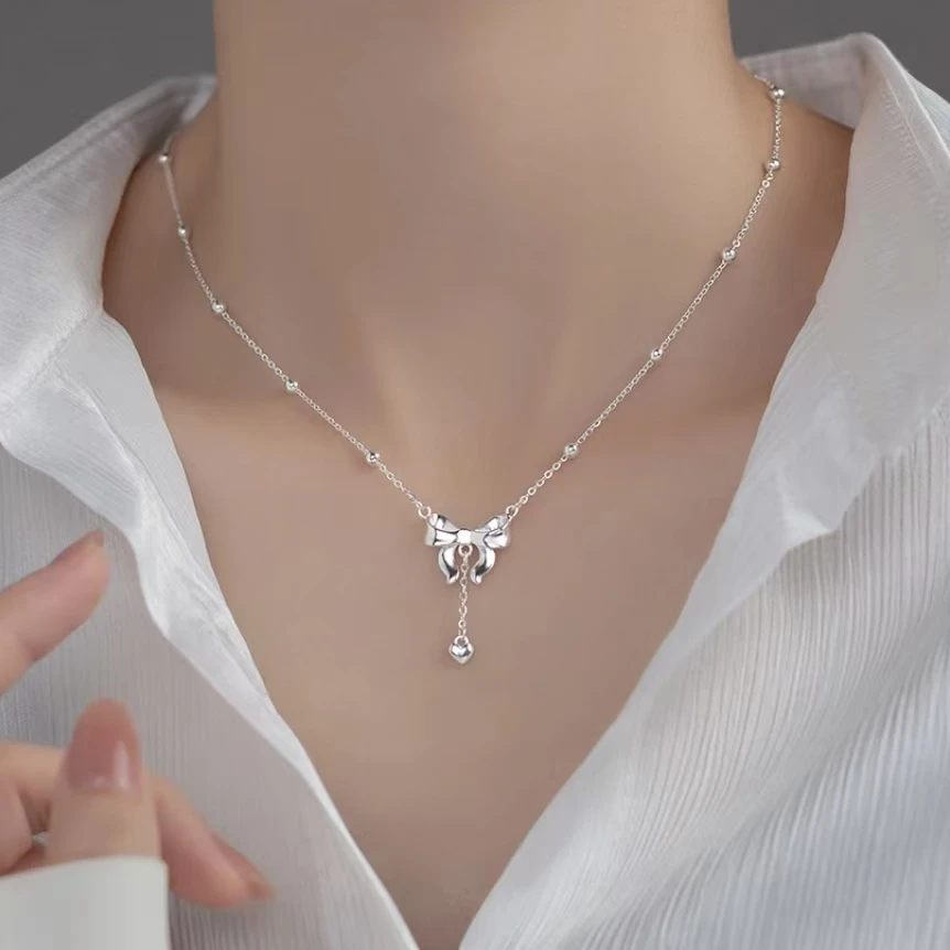 坠链均足银 足银990在逃公主蝴蝶结项链轻奢百搭锁骨链仙女时尚