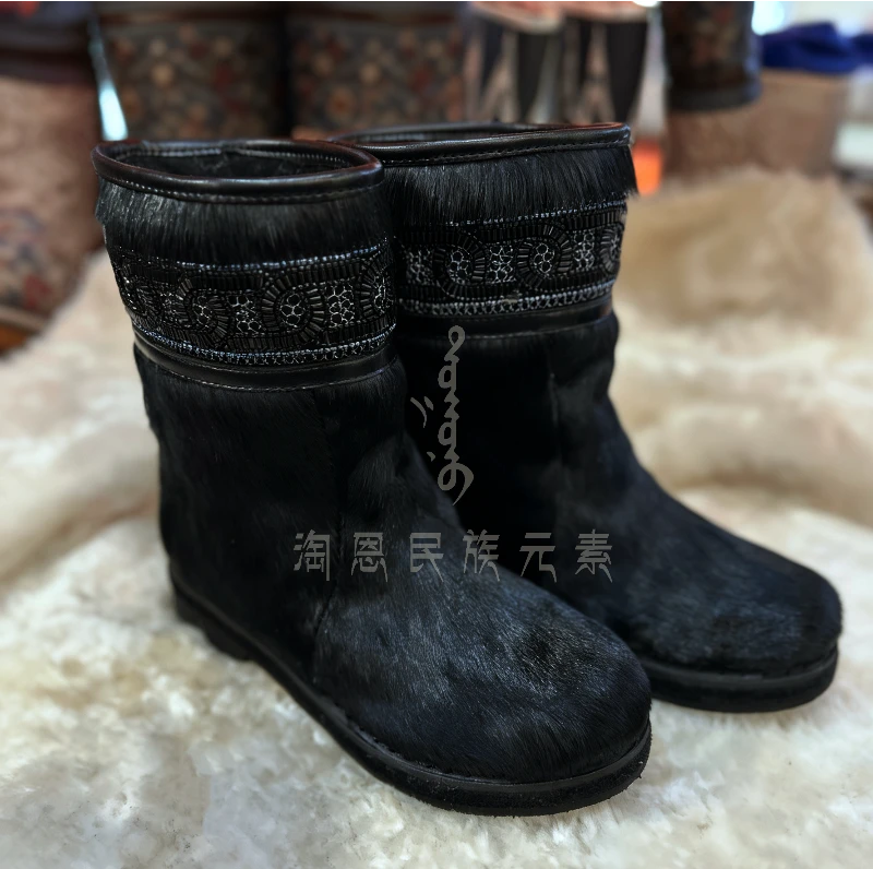 淘恩民族元素中筒马毛串珠时尚保暖女款雪地靴