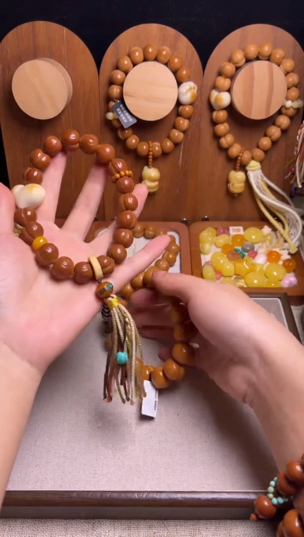 手串猴头核桃m****t全品手工聚宝盆爱心黄隔片橄榄核跑环藏式流苏