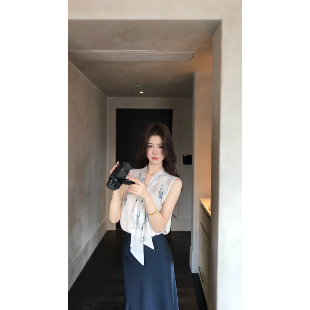 MARIE.COCO复古2025夏季新款小众别致短袖上衣高腰半身裙两件套装