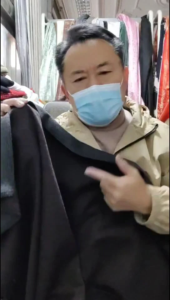 深紫咖雪花针织布料