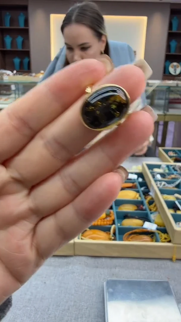 未镶嵌琥珀戒指32秒拍号 假一罚三