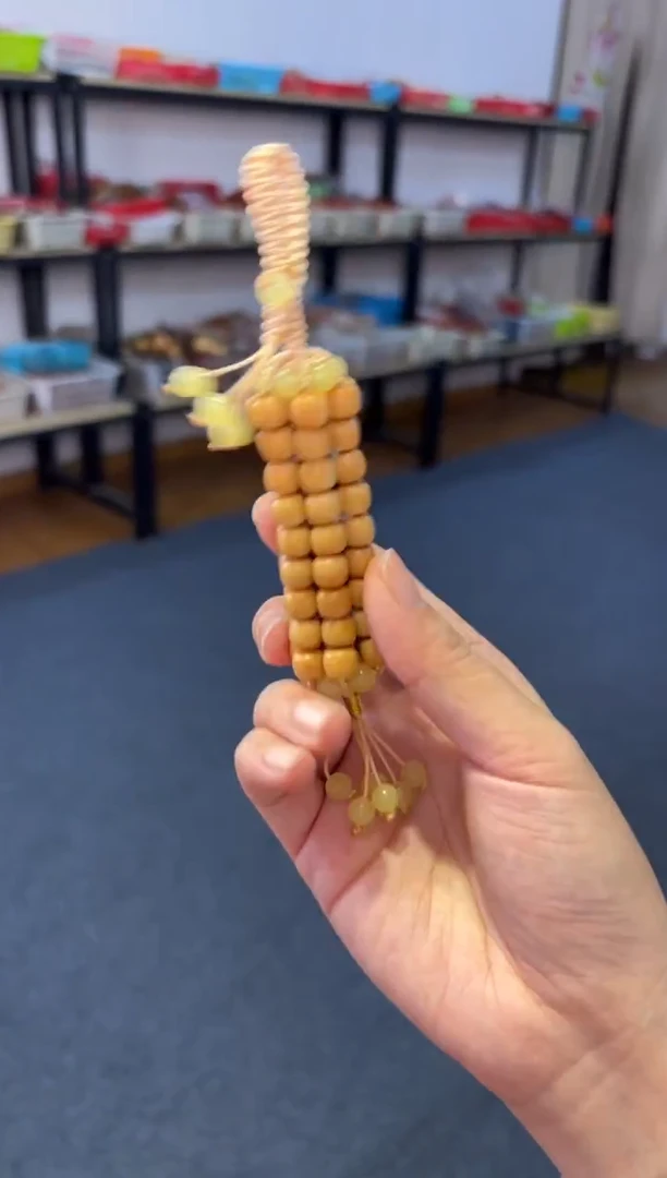 吊坠菩提根/象牙果龙脊玉米手把件