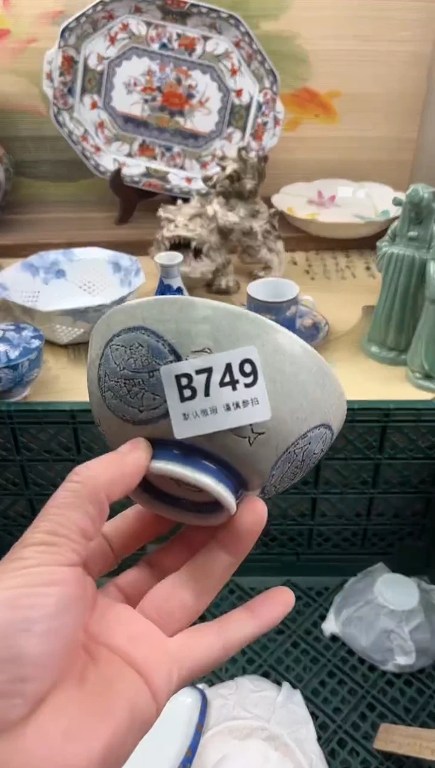 瓷片张**子749
