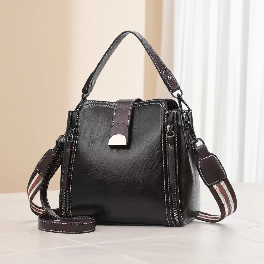 休闲镶嵌三根防盗韩版潮流水桶包斜挎包轻奢竖款单肩